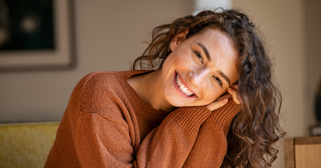 Woman Smiling in sweater